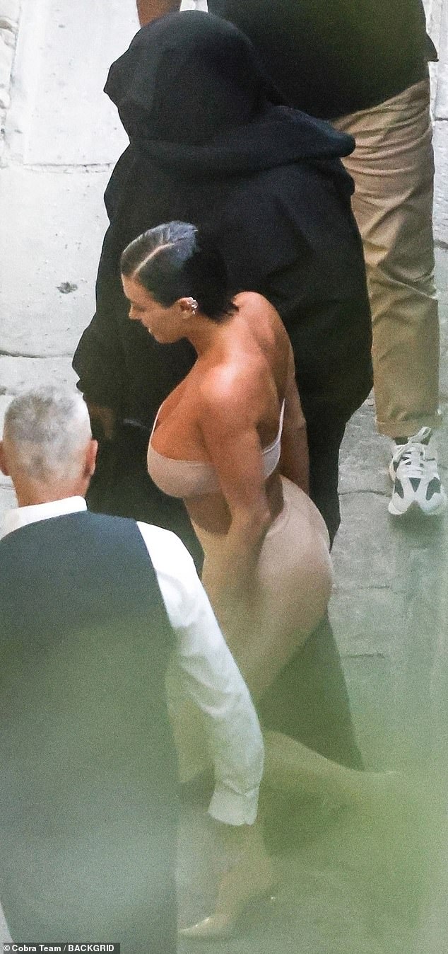 Revealing: The 28-year-old Australian-born architect showed himself extremely busty while wearing a strapless nude bra-like top