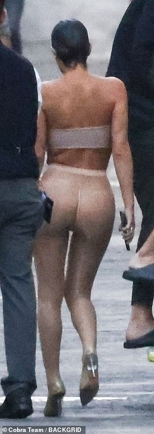 Leggy: Kanye's wife showed off her long, muscular legs