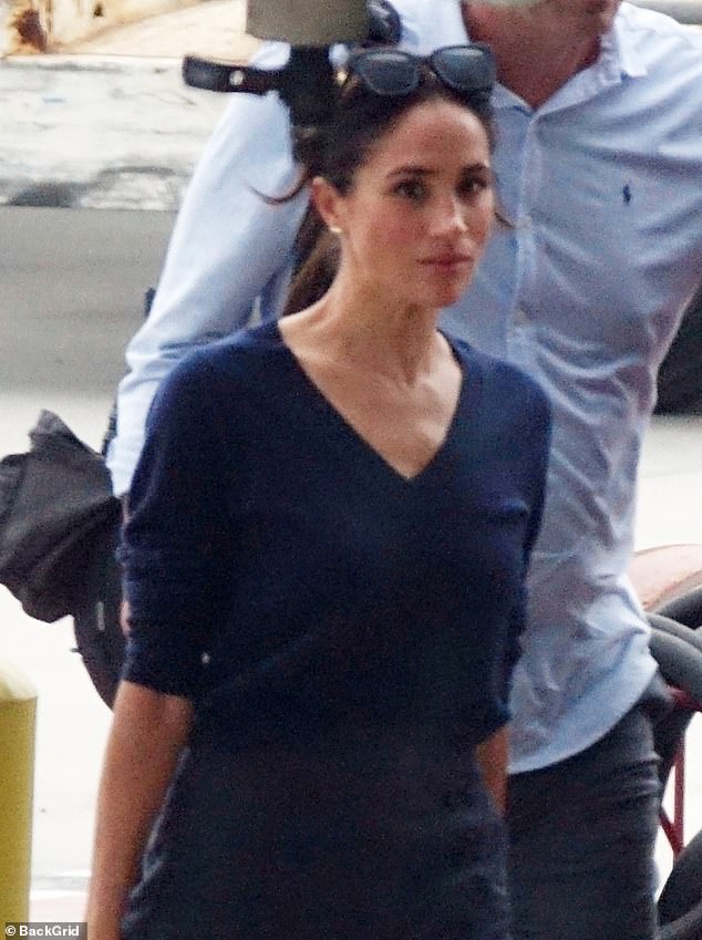 Meghan arrived at LAX last night ahead of her flight to London Heathrow Airport