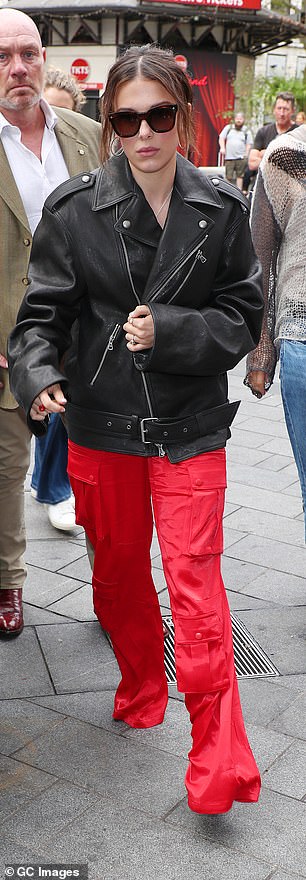 Reddy for it!  Millie opted for another red ensemble later in the day as she was spotted entering the Capital Breakfast radio studios wearing scarlet trousers.