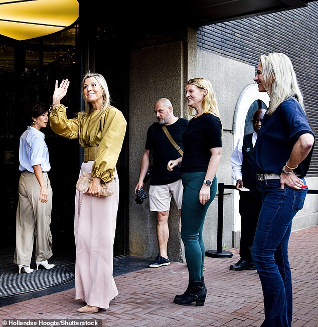 The royal showed off her chic style in a khaki top with balloon sleeves, which she paired with pale pink trousers