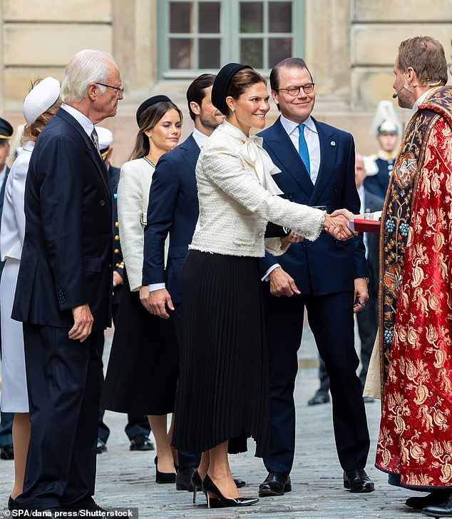 The Swedish royal family, including King Carl Gustav XVI and Queen Silvia, pictured behind their daughter, attended in large numbers for the ceremonial date