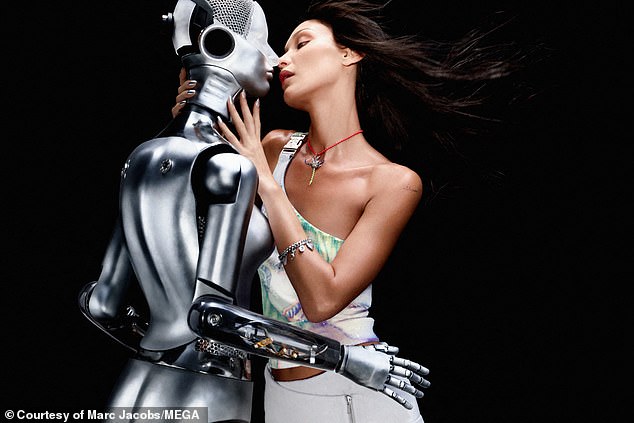 Sci-fi romance: Other photos in the futuristic campaign showed her kissing a robot