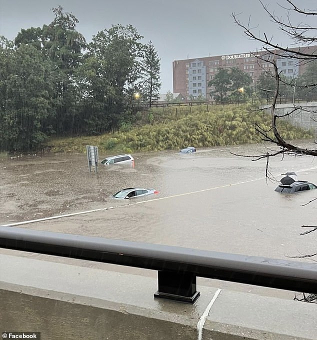 More than 35 inches of rain fell in Leominster, Massachusetts on Monday, flooding entire cars and prompting officials to urge residents to evacuate