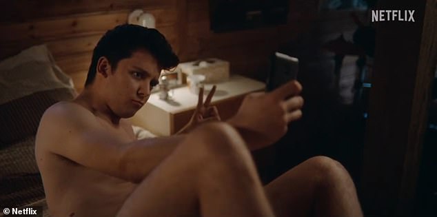 Raunchy: In the new clip, Maeve (Emma Mackey) sends Otis (Asa Butterfield) some raunchy photos as he prepares to do the same