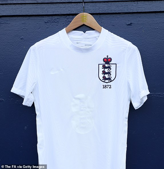 GLASGOW, SCOTLAND - SEPTEMBER 12: A unique England warm-up shirt featuring the original crest from the first Scotland-England meeting in 1872, is seen ahead of the 150th Anniversary Heritage Match between Scotland and England at Hampden Park on September 12, 2023 in Glasgow, Scotland.  (Photo by Eddie Keogh - The FA/The FA via Getty Images)