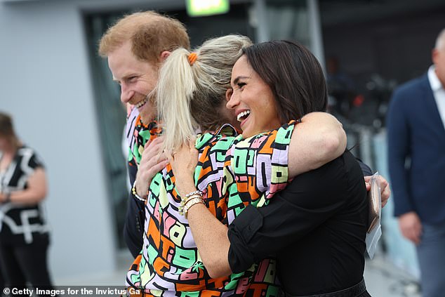 Before taking the stage, the Duke and Duchess of Sussex met friends and families of competitors