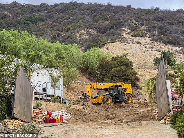 Heavy machinery is on display throughout the 80-acre site at 9650 Cedarbrook Drive