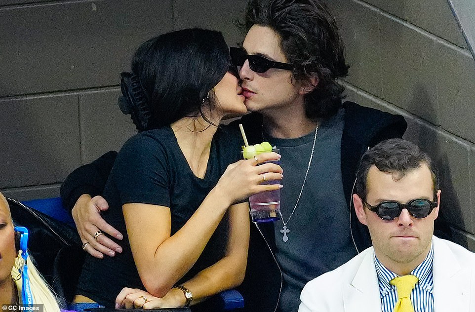 Kissing Kylie in a corner: The pair were spotted next to each other at the US Open in New York this weekend, where they cuddled while holding a drink