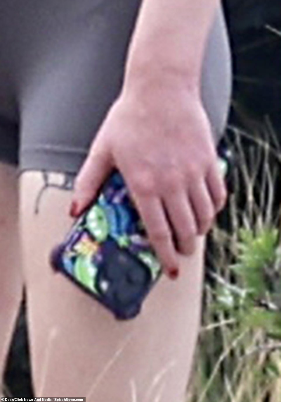 As she quietly smoked outside, Turner grabbed her phone, which was protected by a Toy Story-themed phone case.