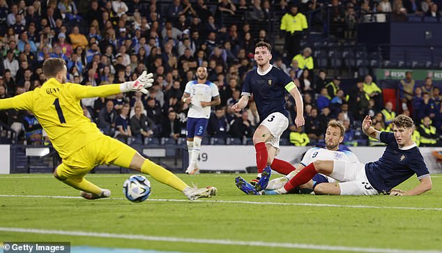 Bellingham set up England captain Harry Kane (second from right) late on for the third goal