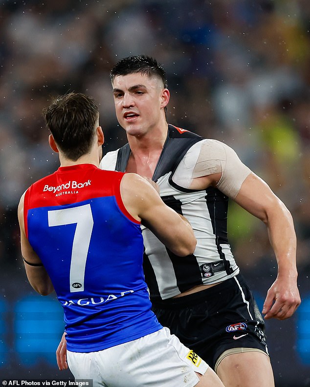 Maynard's acquittal (pictured clashing with Melbourne's Jack Viney after knocking out Angus Brayshaw) has divided the football world