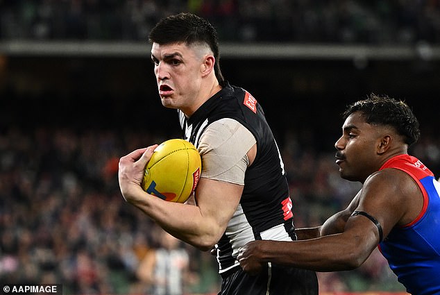 Maynard (pictured during the final win over the Demons) faced a lengthy ban after his choke reportedly knocked Angus Brayshaw out for two minutes