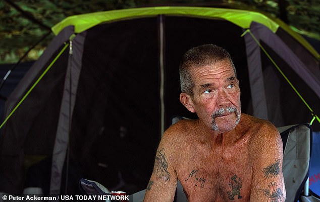 William Honeker is pictured outside his tent in Toms River, New Jersey, on August 10