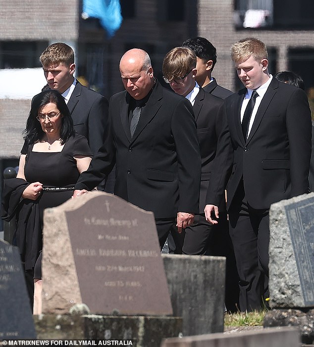 Leonia Picone's sister Ronelle Cameron is seen on the left of the photo, next to her husband Kevin.  Leonia's son Tristan is pictured on the right