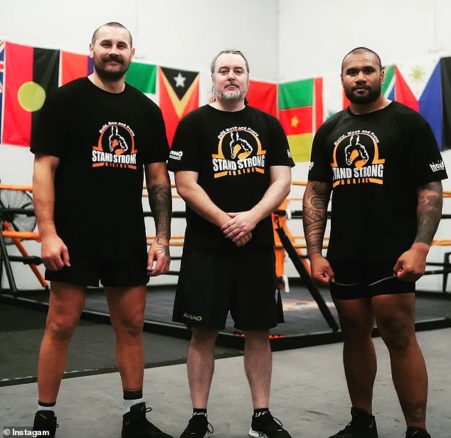 Campbell-Gillard sparring with Eels teammate Junior Paulo (right, pictured with trainer Justin Fitzgerald, centre)