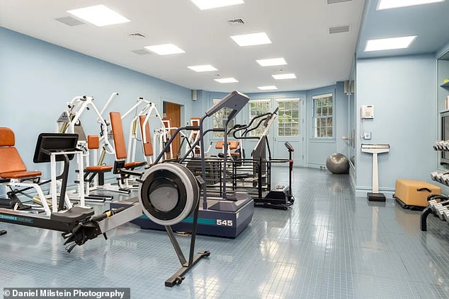 A full gym comes complete with a ballet bar and floor to ceiling mirrors