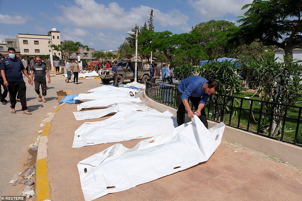 Body bags lie on the streets of Derna, eastern Libya.  Thousands have been killed by the floods so far