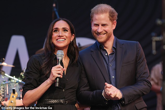 Delivering an emotional speech to 1,600 attendees, friends and family at a glittering party at the hotel in Dusseldorf, the Duchess of Sussex, 42, stunned in a black shirt dress from Banana Republic, costing £112