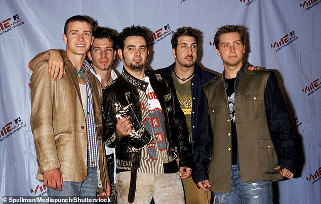 What it was like: The NSYNC boys posed with an MTV Award in their glory days in the late 1990s