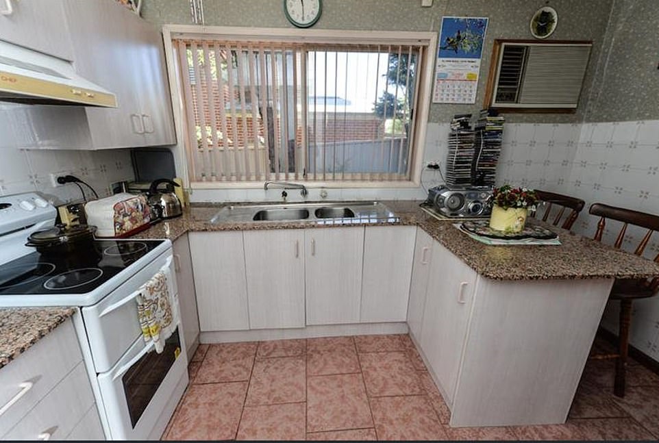 The house where the family lived for up to five years is now abandoned and 'uninhabitable' with leaking sewer pipes, damaged doors and a 'filthy' interior.  Above is an old real estate photo