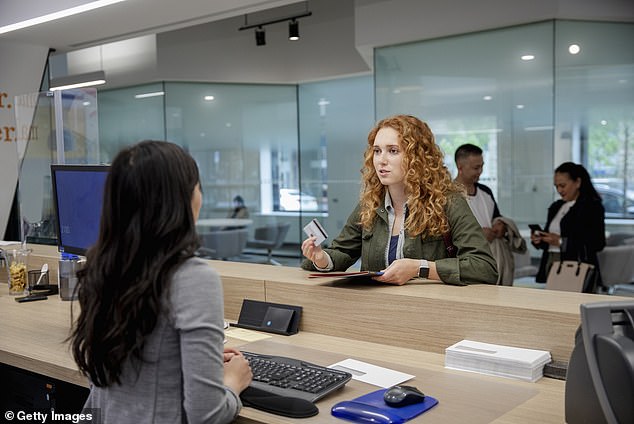 The biggest change for Macquarie's traditional banking customers will come in May next year, when the company will stop handling cash and depositing and withdrawing checks at the counter.