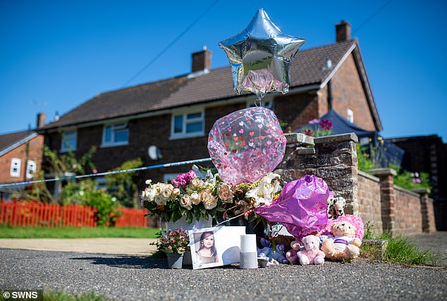 Tributes outside Sara Sharif's home, where the little girl's body was found on August 10