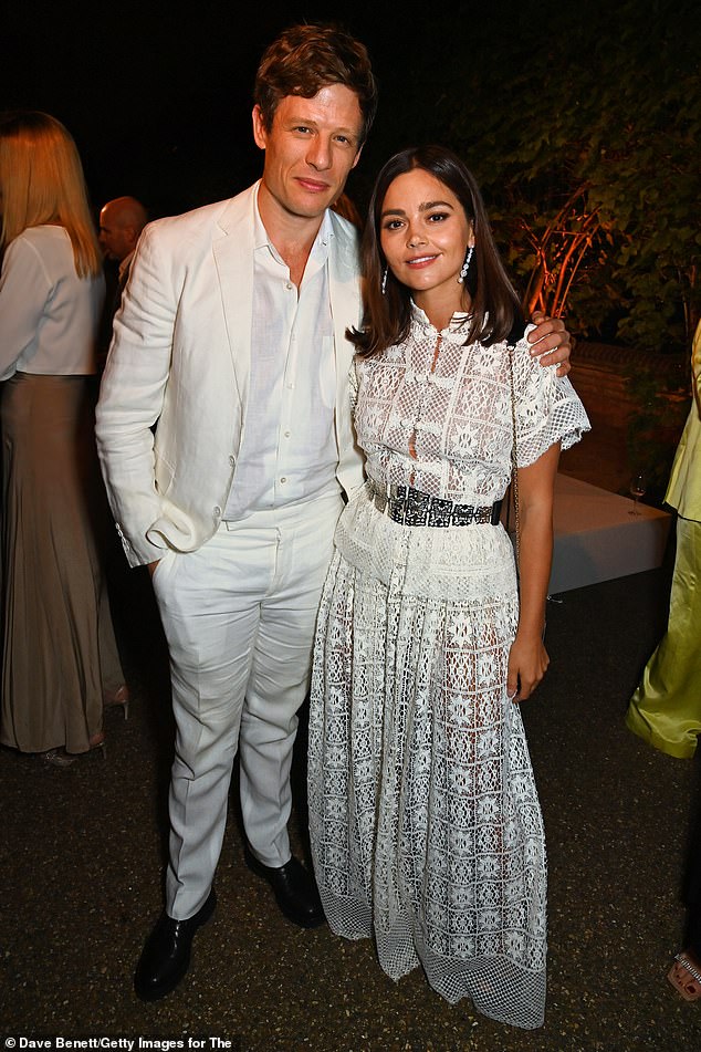 Smart: James looked dapper in a white linen suit as he posed with boyfriend Jenna