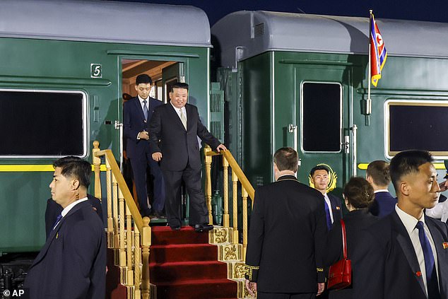 Kim Jong Un steps off his train after crossing the border into Russia at Khasan, about 127 kilometers south of Vladivostok, Russia, on September 12, 2023.