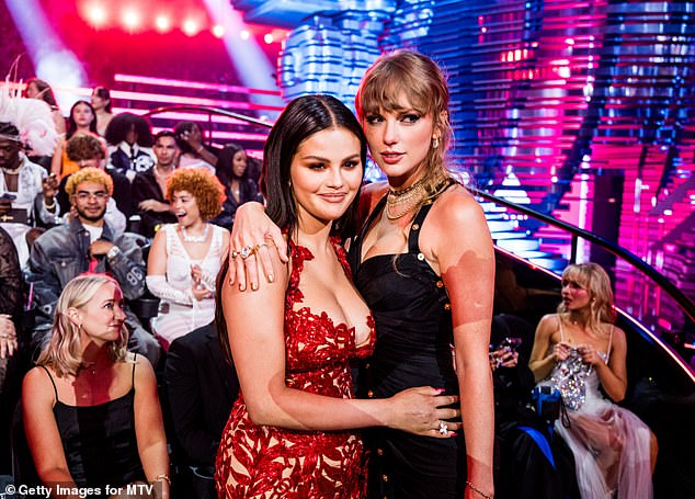 Cute: She also shared some adorable moments with her boyfriend Taylor Swift, including a warm hug