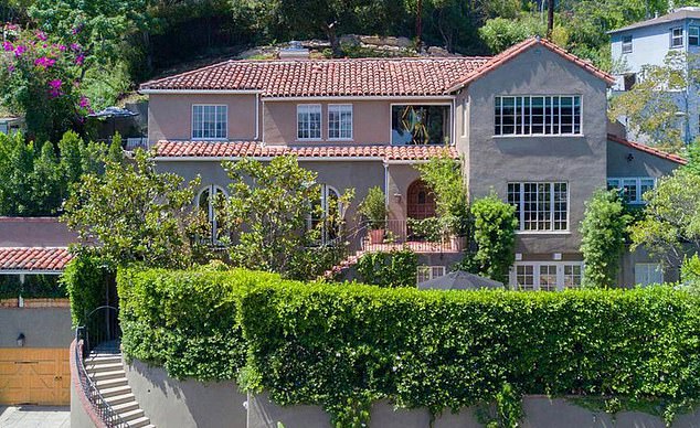 Usher and his then-wife Grace Migel became the target of the debt in 2018 after listing their $4.2 million property near the luxurious Chateau Marmont on Hollywood's Sunset Strip.  The advert highlighted the 'striking artwork' and 'eye-catching décor' and also included several photos of the inside of the property with many items on display.