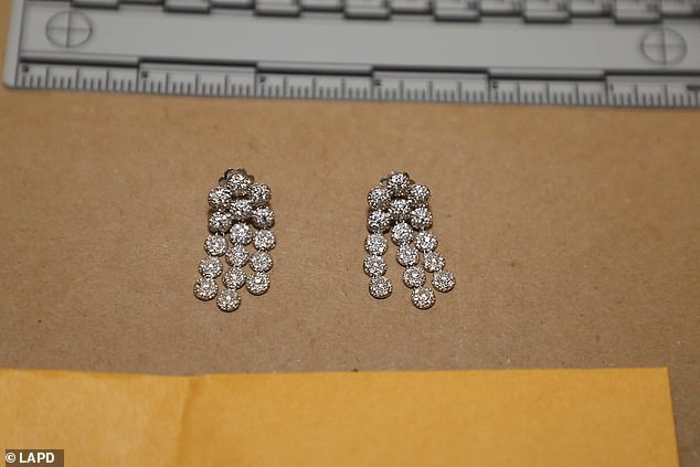 Glittering earrings were among the thousands of pieces of jewelry recovered in the robberies, which police said were carried out in a 