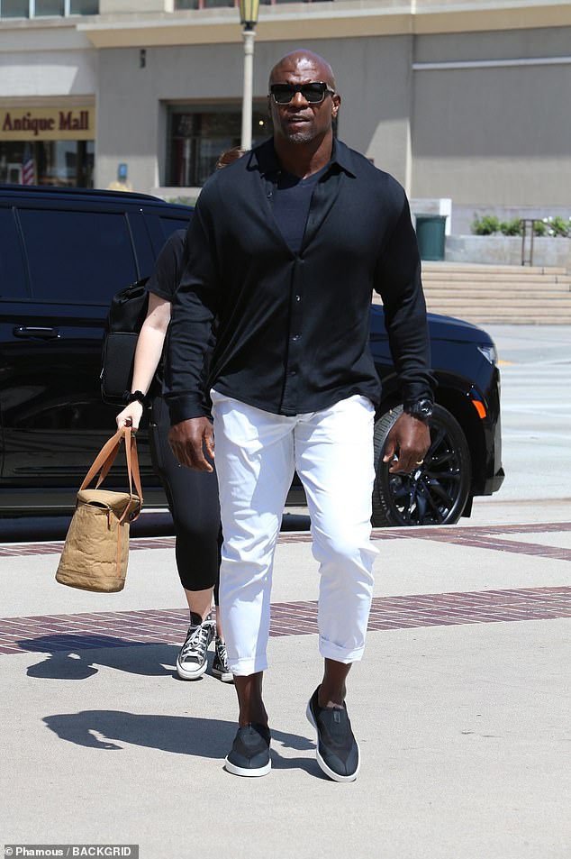 Host with the most: AGT host Terry Crews, 55, looked summer-ready in his black and white outfit before the show