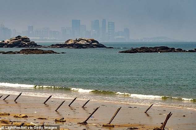 View of Xiamen city in Fujian province from the beach of Dadan Island in Taiwan