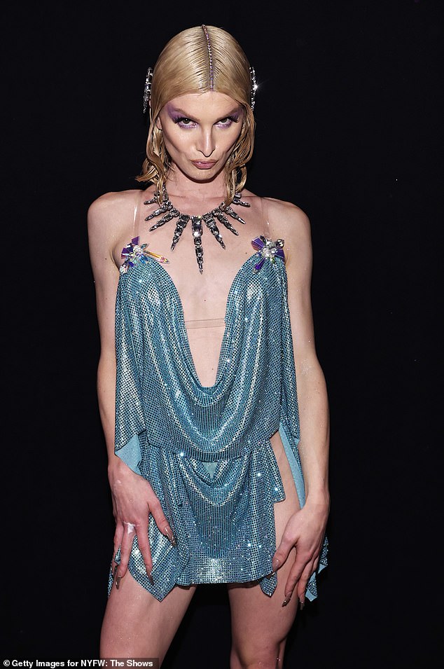 Mulvaney's runway look was head-to-toe sparkling with matching, dazzling accessories and glitter makeup