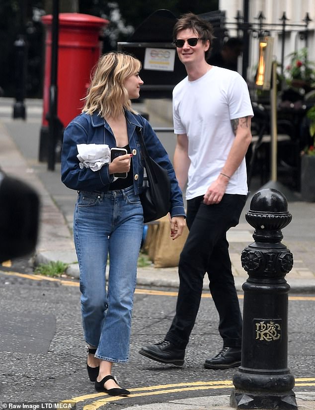 Banter: The couple was seen laughing and joking together during the outing on Wednesday