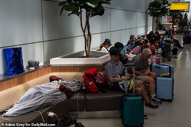 Delayed passengers at Newark Airport during the 4th of July holiday weekend