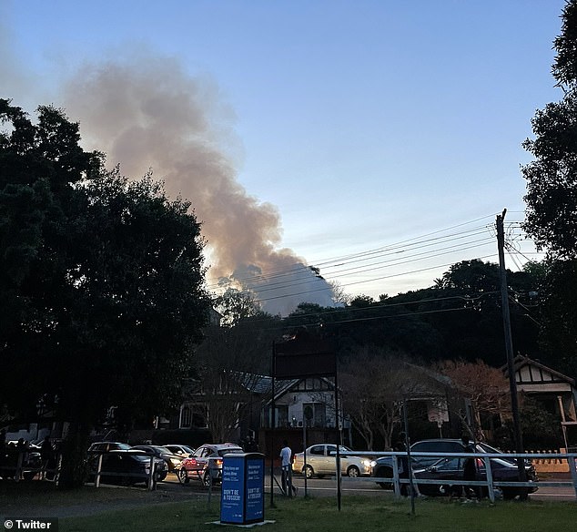 The house fire, which spread to a home near the Cooks River, sent plumes of smoke rising above busy streets