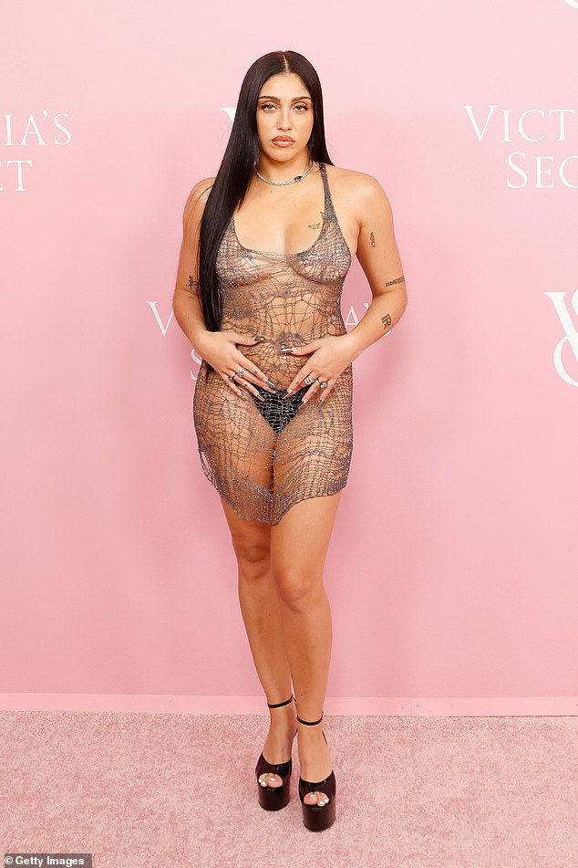 Racy: It comes after she put on a very daring show in a sparkling sheer thong dress at the launch of Victoria's Secret The Tour last week