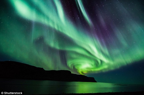 There are two types of aurora: Aurora Borealis (archive photo), which means 'dawn of the north', and Aurora Australis, 'dawn of the south'. The phenomena light up when electrically charged particles from the sun enter the Earth's atmosphere