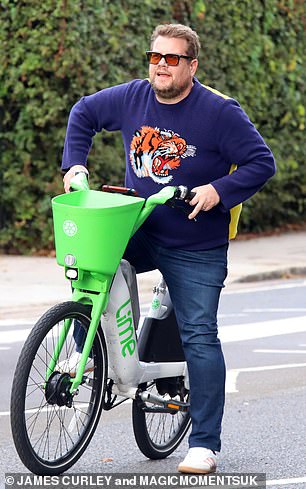There he is: Corden was easy to spot in a boldly patterned Gucci sweater during his outing with Styles on Wednesday