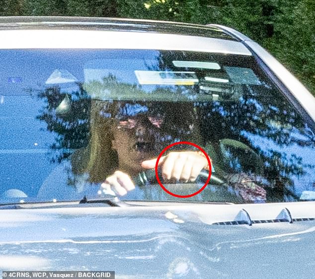 Ahead of their dinner outing, Britney was spotted riding in the car with Paul after Sam filed for divorce , as seen in this photo in August without her ring