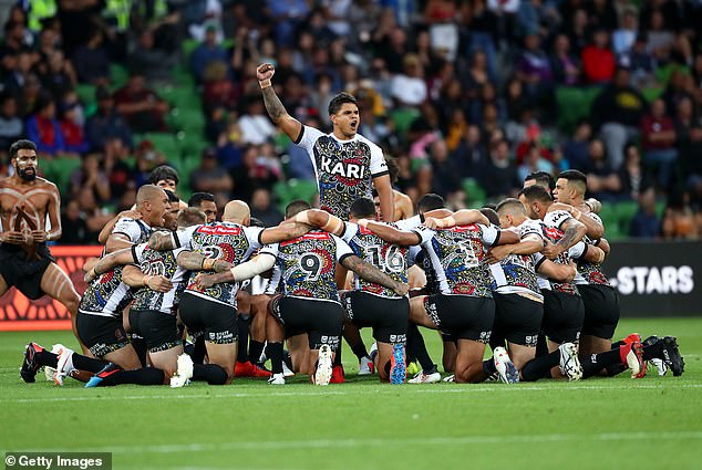 At the time, the NRL Indigenous All Stars caused controversy for not singing the national anthem at the 2019 All Stars match. Pictured is Latrell Mitchell leading the Indigenous battle cry