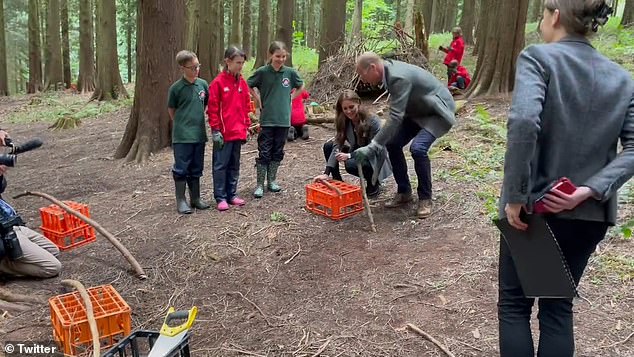 The royal couple clutched branches as they dived into activities in Hereford