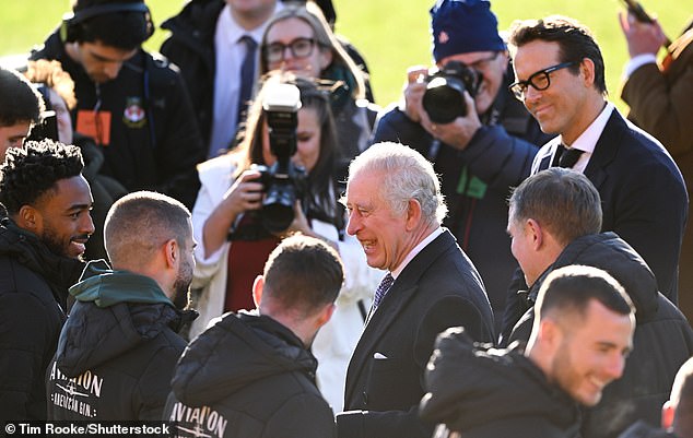 King Charles was also introduced to Wrexham players by club manager Phil Parkinson