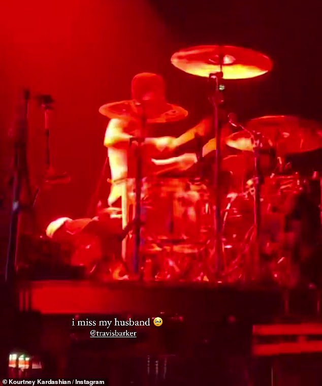 Get lost!  Travis sang what appeared to be a drum solo while shirtless and bathed in red light during what was likely a European tour stop earlier this week