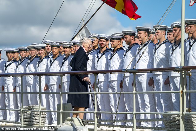 Queen Margrethe was seen greeting the navy as she boarded a ship in Stockholm