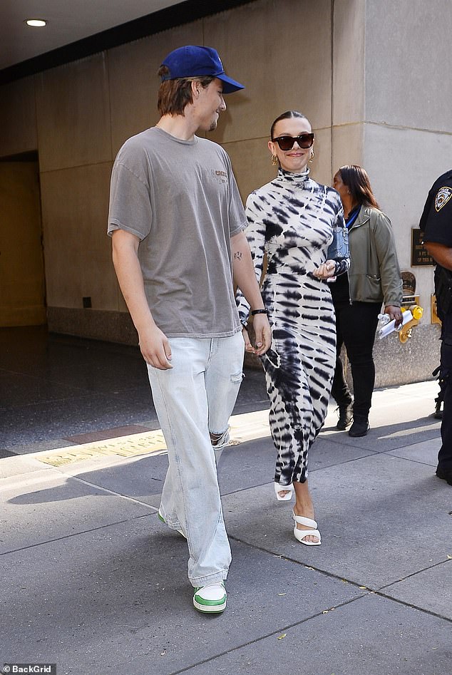 Cute: Her third outfit was for her appearance on the Today Show;  she was spotted leaving NBC Studios in a long-sleeved tie-dye dress, with shades of black and white
