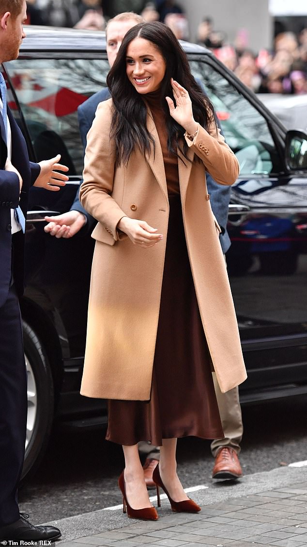 Ahead of the Sussexes' 2020 announcement that they were stepping down as senior royals, Meghan arrived in London to meet the High Commissioner in a power outfit consisting of various shades of brown.