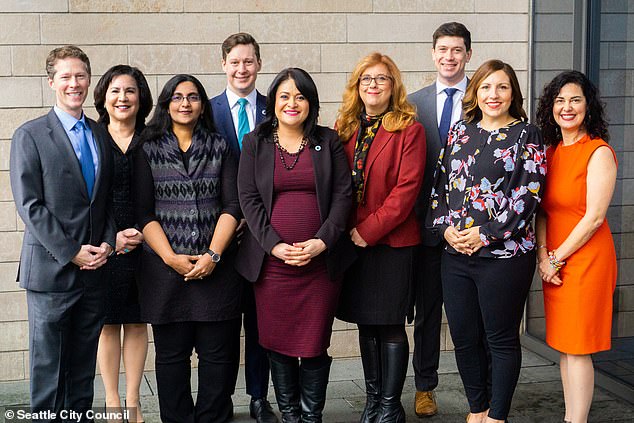 Seattle is the only city in the state where it is legal to use hard drugs in public.  Far-left councilor Teresa Mosqueda, best known for defending a man who threatened to kill police officers, has rejected a bill to criminalize drugs.  (Above) Seattle City Council, Mosqueda, 8th from left